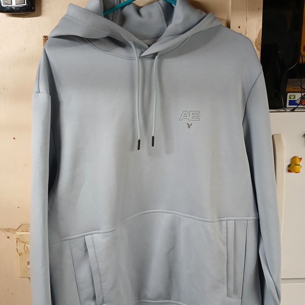 American Eagle Outfitters Men's Light Blue Hoodie with Subtle Logo